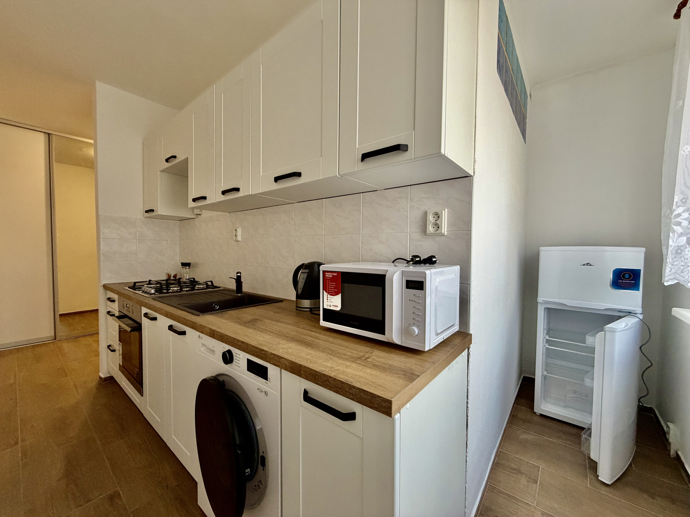 Priestranný 2i byt (56 m²) na prízemí v tichom Ružinove